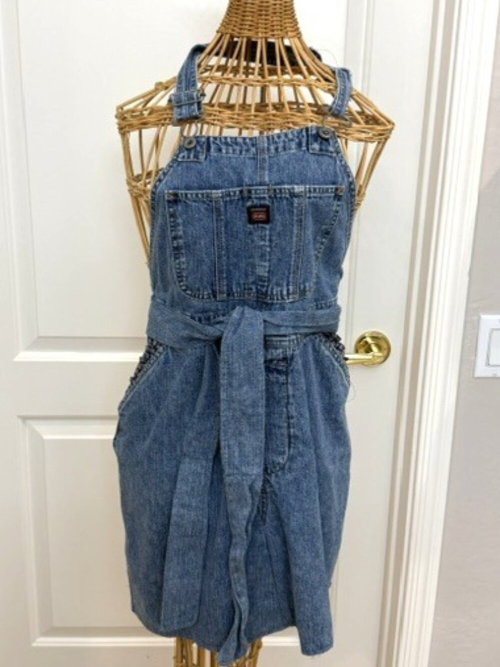 Handmade denim overall apron with pockets.